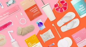 Styled flatlay featuring postpartum care products included in a prepacked hospital bag